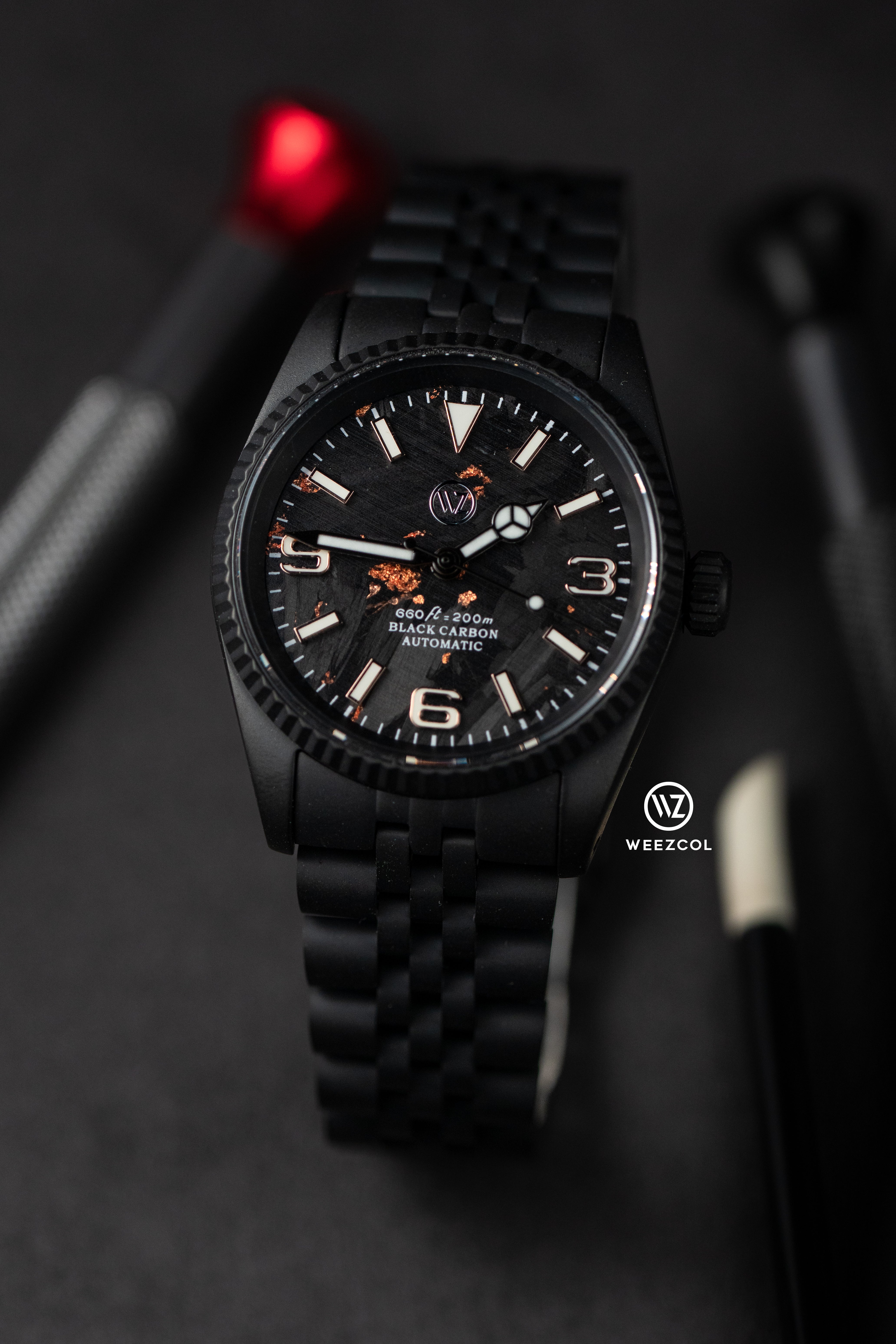 Seiko Explorer: Carbon Fiber Rose Gold in Matte Black