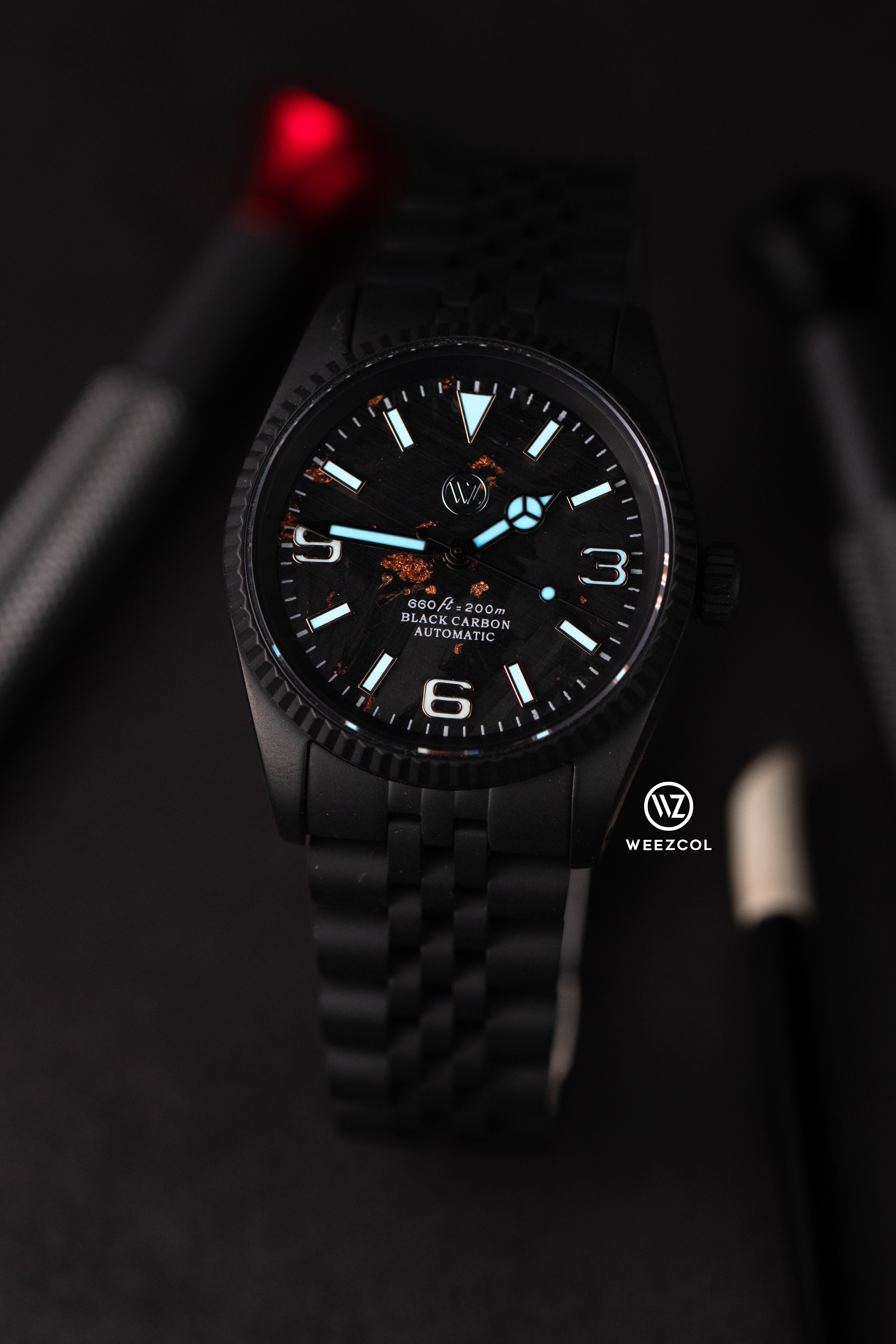 Seiko Explorer: Carbon Fiber Rose Gold in Matte Black